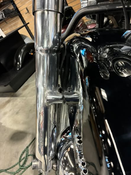 Before and After pictures of Motorcycle Fork Restoration on this Harley-Davidson Heritage Softail.
